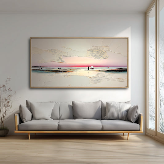 The large, textured sunset painting adds a serene, warm glow to a bright, minimalist living room, hanging over a modern gray sofa.