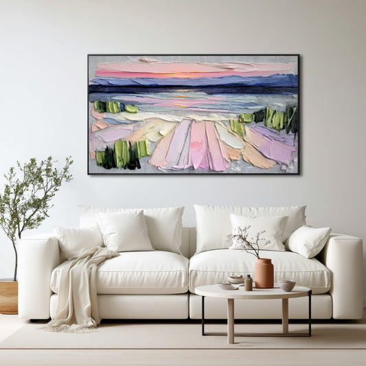 Original vibrant abstract sunset painting serving as a luxurious focal point above a cream sofa and plush velvet chairs in an elegant, modern room.