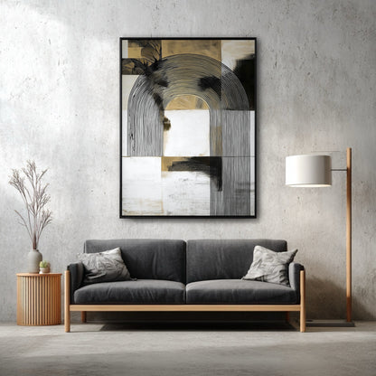 A vertical abstract arch painting hangs on a concrete wall above a modern dark grey sofa, adding sophistication to the industrial-style room.