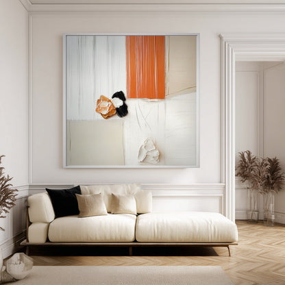  Original art over a light sofa, creating a classic modern look against detailed wall moldings and hardwood floors.