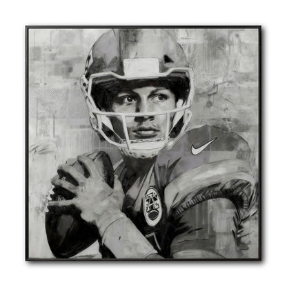 Original framed black and white painting of a football quarterback in a helmet, focused and ready to throw the ball.