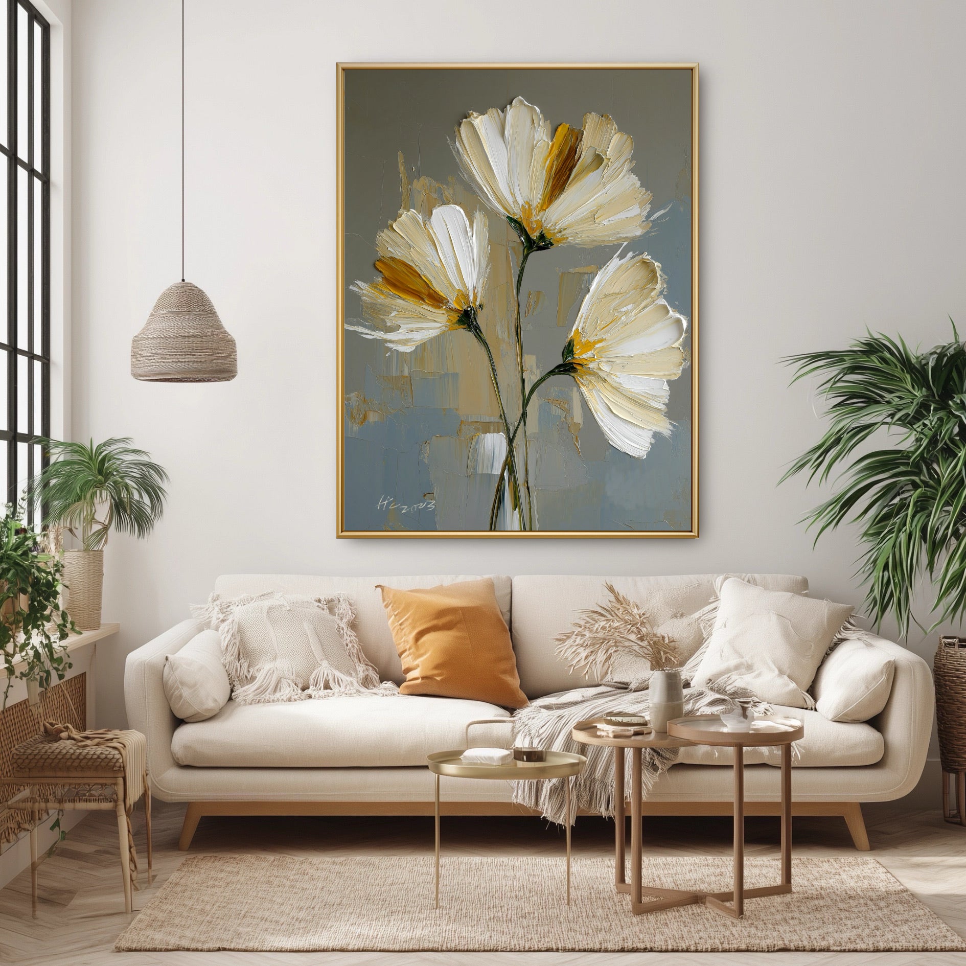 Abstract white blossom painting in a warm boho interior. Earthy yellow accents harmonize with indoor plants and organic decor.