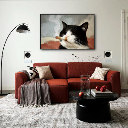 Smoking cat portrait above a warm terracotta sofa, adding a playful, modern edge to a cozy living room with a neutral rug.