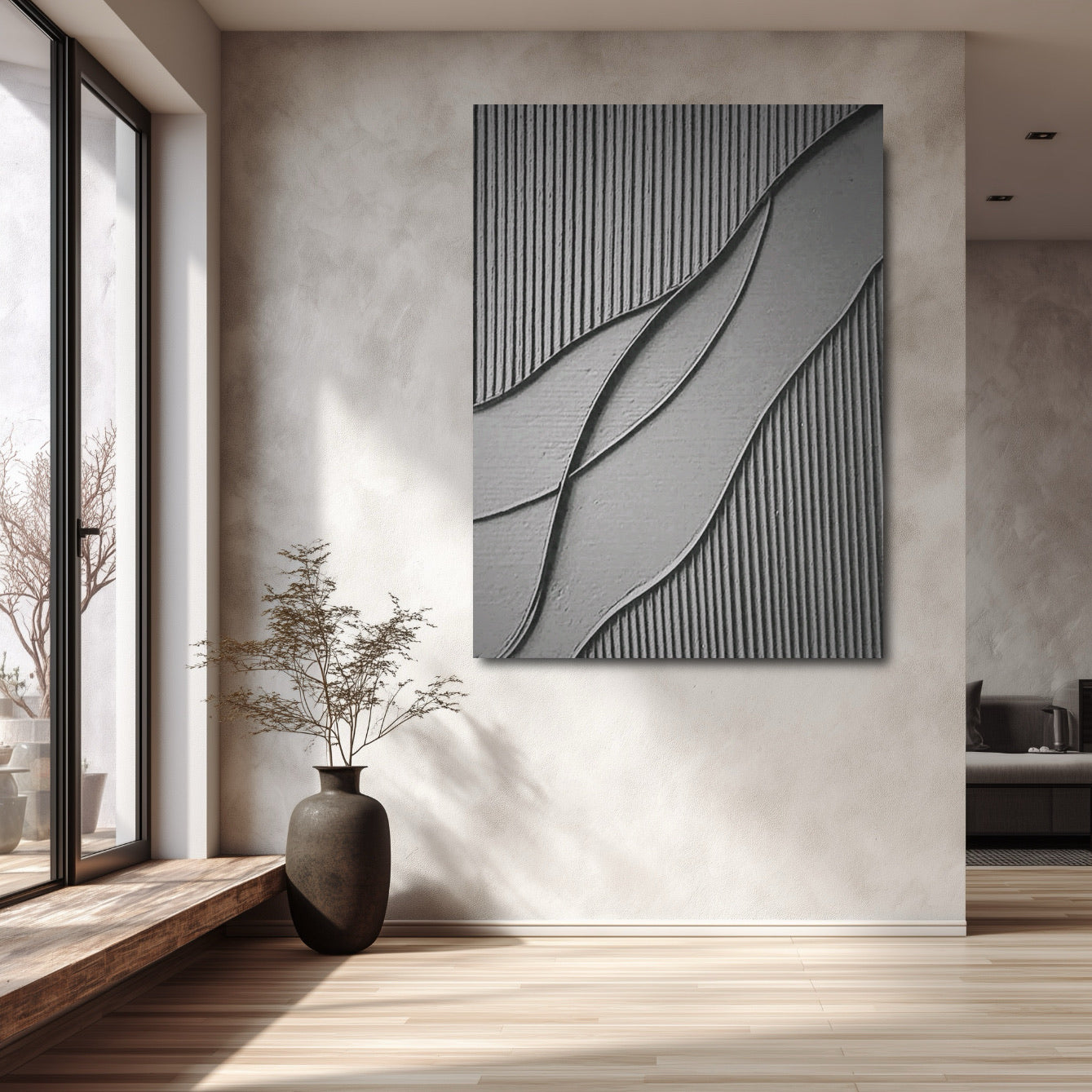 Abstract relief painting on neutral wall in a bright, minimalist room with large windows, natural wood sill, and tall vase.