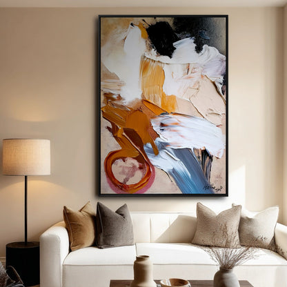 Original abstract impasto painting with warm tones hanging above a white sofa in a modern, neutral-toned living room.
