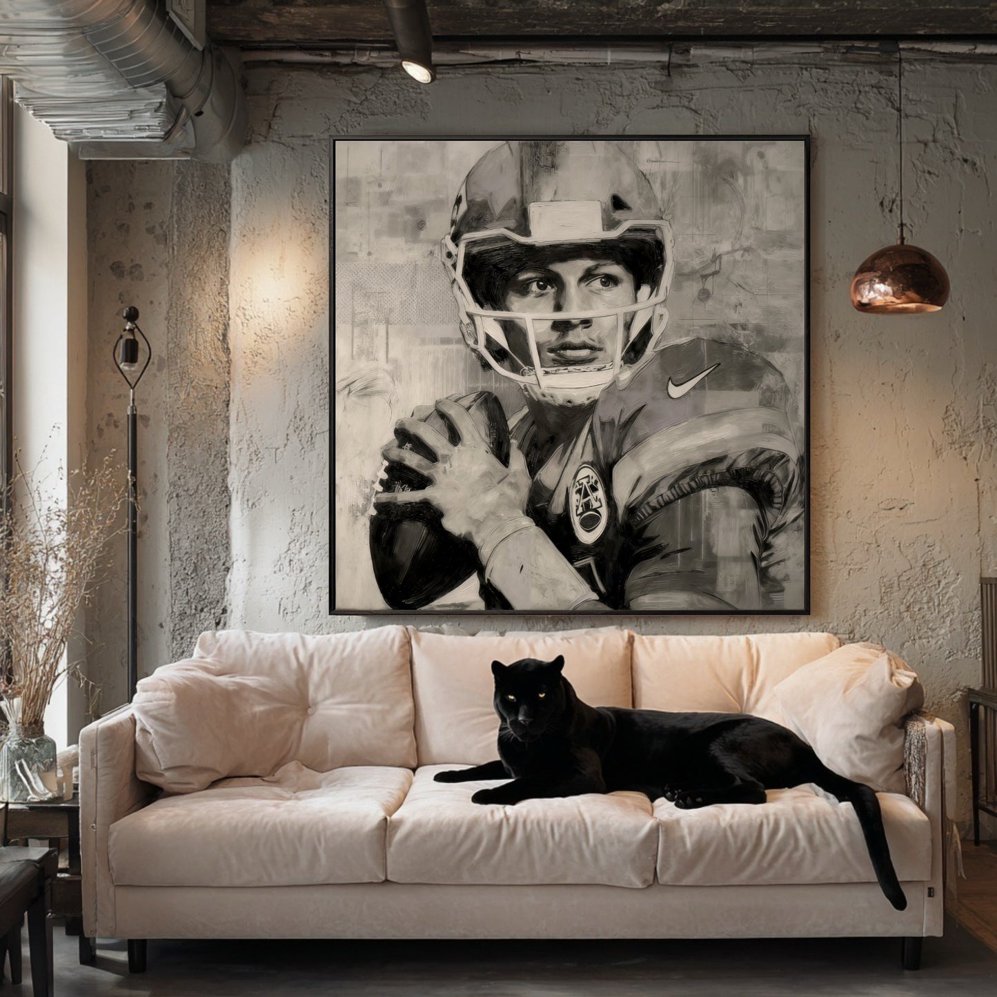 Framed quarterback portrait in an industrial loft with a pink sofa. A black panther is lying on the sofa.