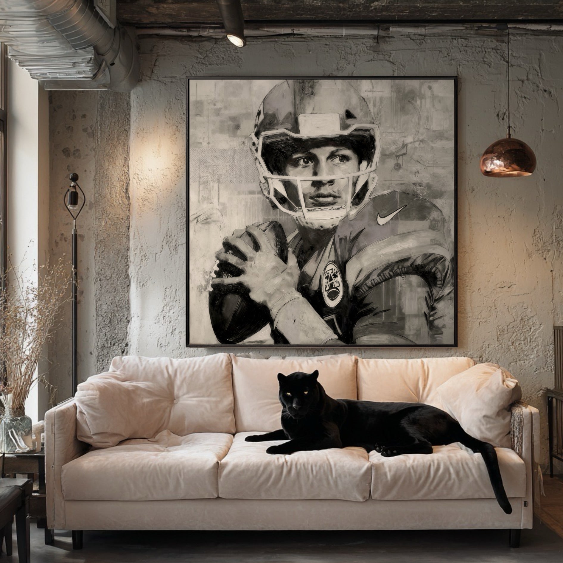 Framed quarterback portrait in an industrial loft with a pink sofa. A black panther is lying on the sofa.