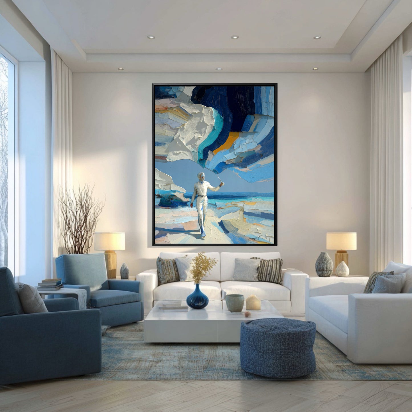 Large coastal canvas in bright family room. Cool ocean tones match blue armchairs for a fresh, harmonious living space design.