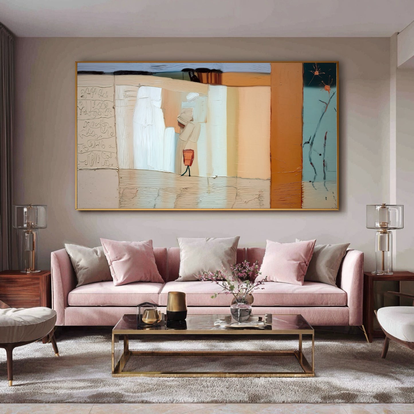 A large abstract painting hangs above a pink velvet sofa in a chic, modern living room with gold and glass accents.