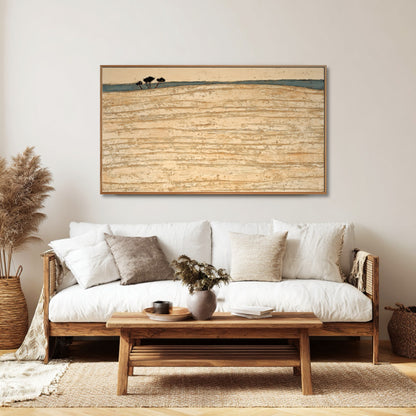 Coastal abstract original painting reinforces the beachy, relaxed ambiance and natural rattan textures of this Bohemian living space.