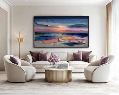 Abstract impasto painting in a luxurious, elegant living room with cream swivel chairs, velvet pillows, and a gold marble coffee table.