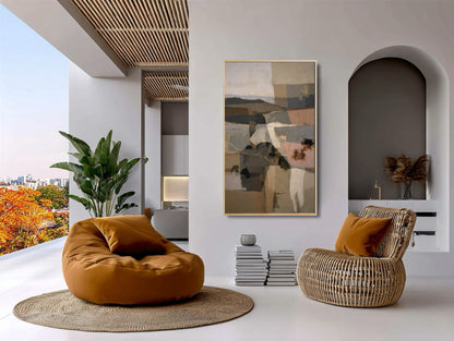 Textured abstract art complements the rattan chair and natural textures of this vibrant, contemporary indoor-outdoor lounge space.