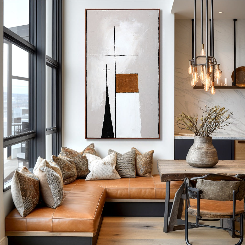 Modern living room with brown leather sofa, abstract painting, and wooden dining table.
