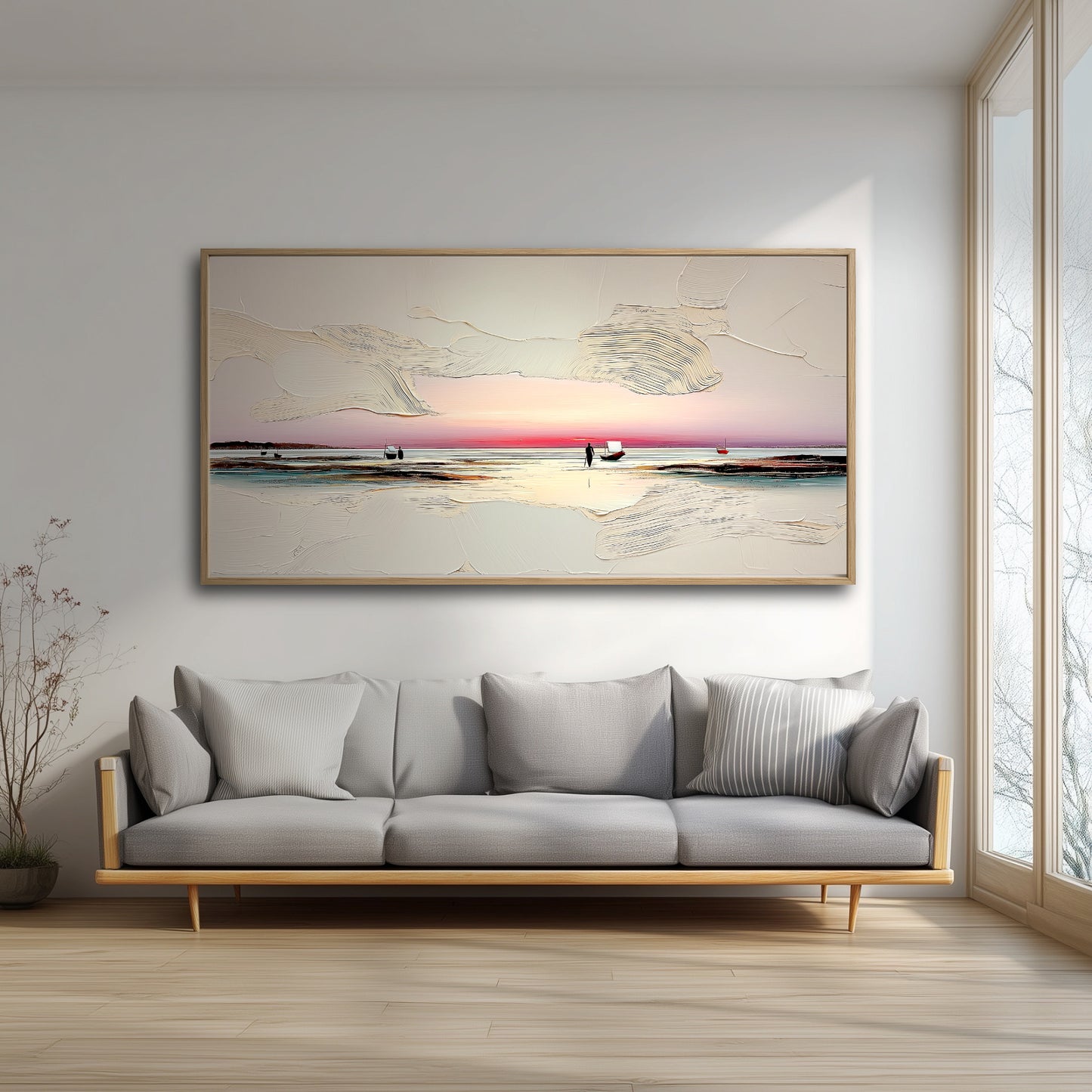 The large, textured sunset painting adds a serene, warm glow to a bright, minimalist living room, hanging over a modern gray sofa.