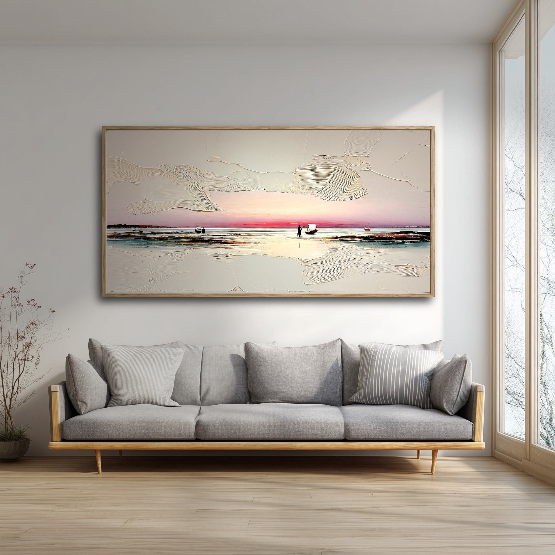 The large, textured sunset painting adds a serene, warm glow to a bright, minimalist living room, hanging over a modern gray sofa.
