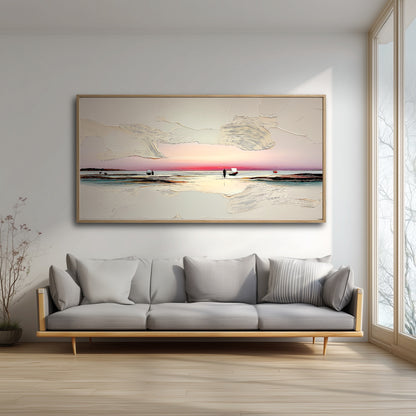The large, textured sunset painting adds a serene, warm glow to a bright, minimalist living room, hanging over a modern gray sofa.