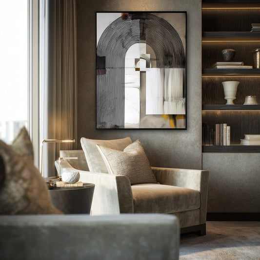 Original abstract geometric painting in a moody, luxurious sitting room with a beige armchair and built-in shelving.