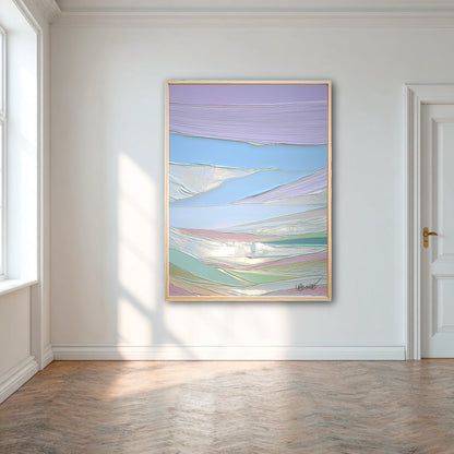 A large pastel textured painting is the sole focal point in a bright, minimalist room with white walls and a herringbone wood floor.