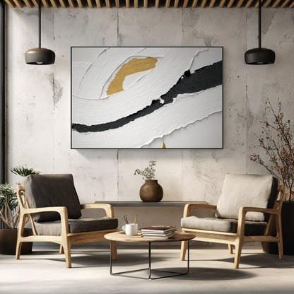 Horizontal abstract art with a torn paper effect on a concrete wall above two modern armchairs in an industrial-style room.