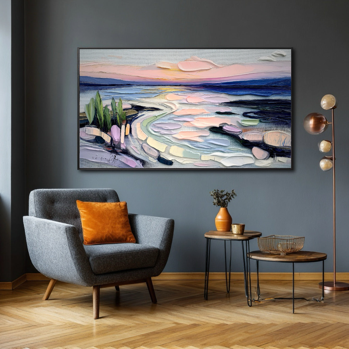 Original textured abstract art provides a burst of color against the dark gray wall; it complements the orange pillow and mid-century modern accent chair.