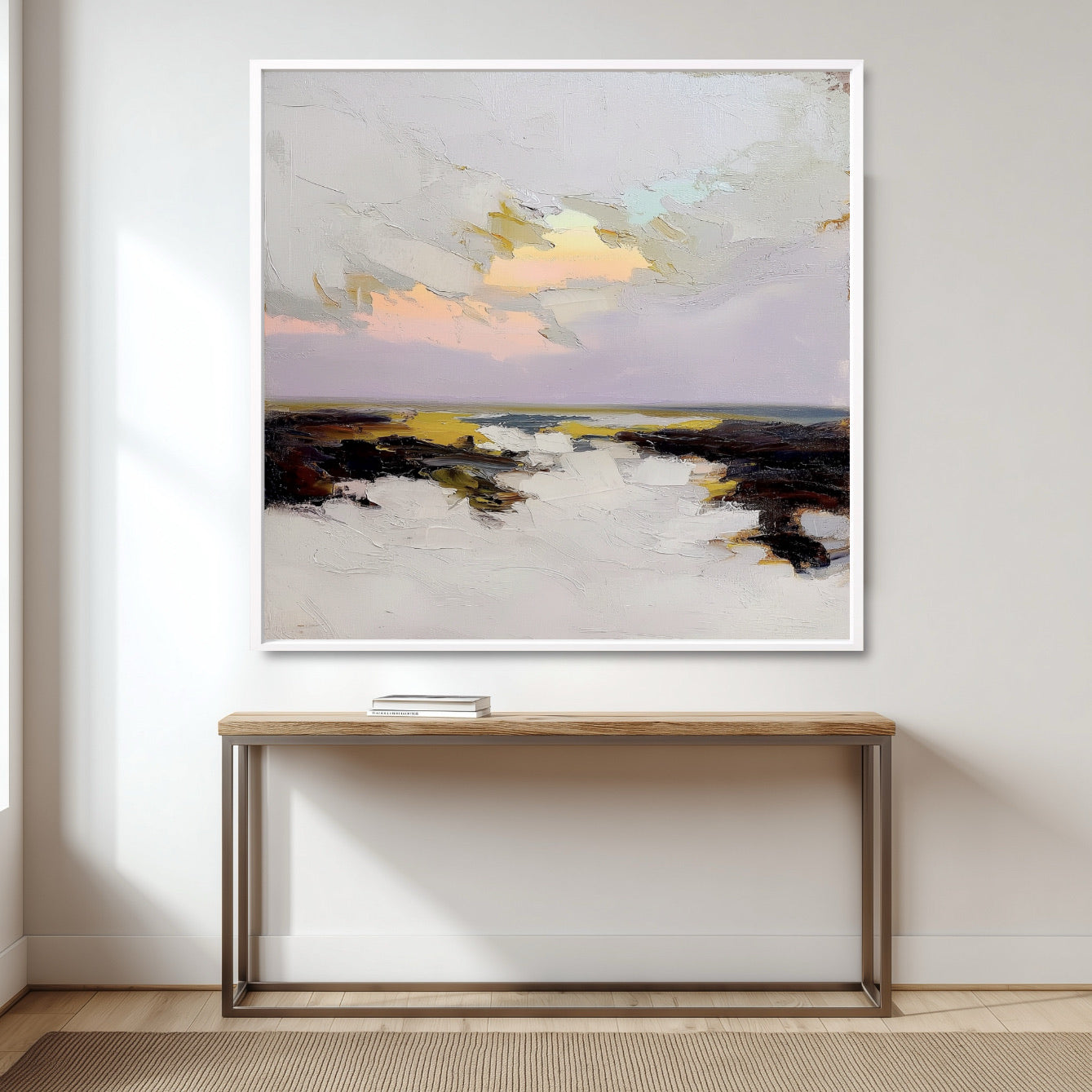 Abstract landscape painting on a wall above a wooden console table.