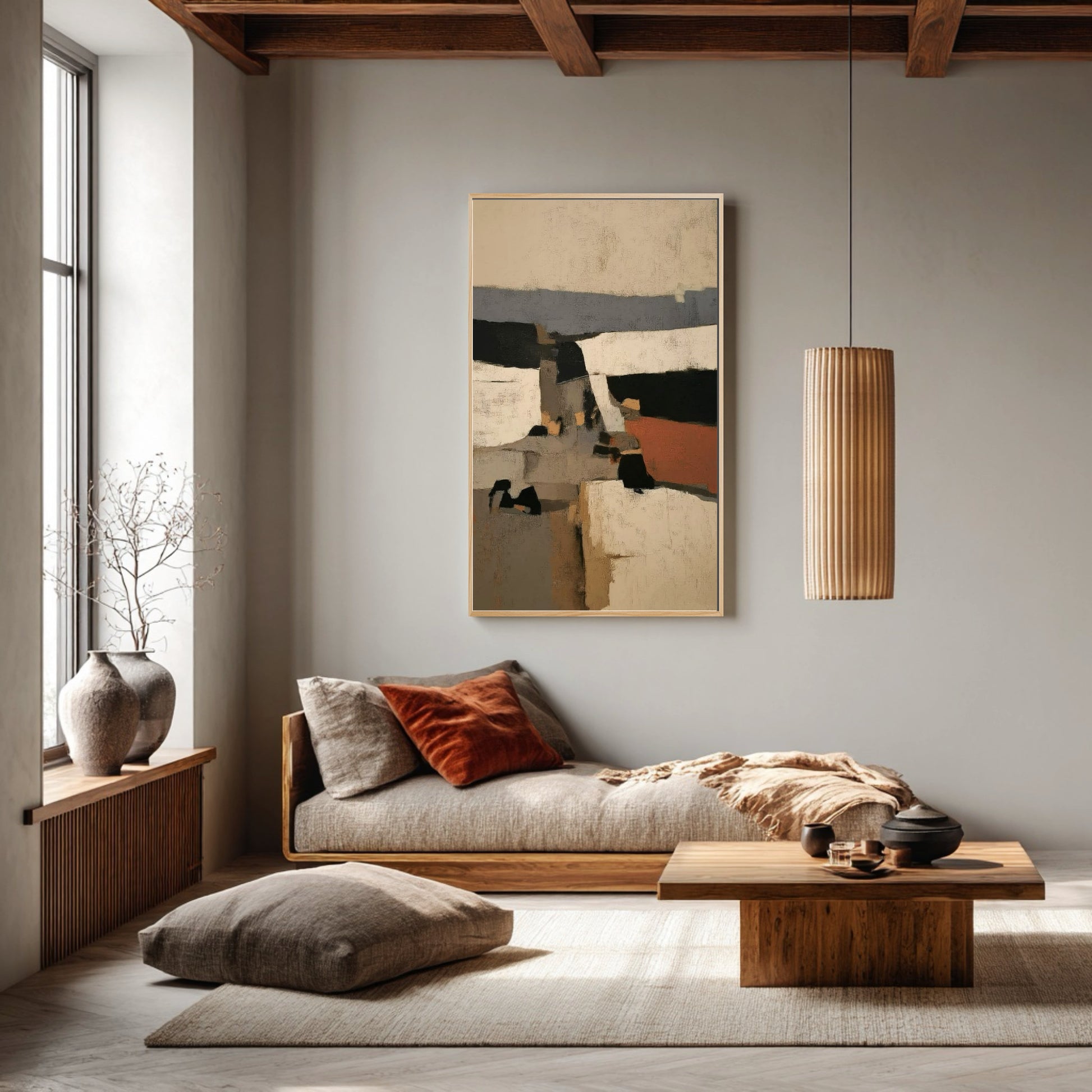 Vertical abstract painting harmonizes with the natural wood beams, low sofa, and muted textures in this cozy Japandi-style retreat.