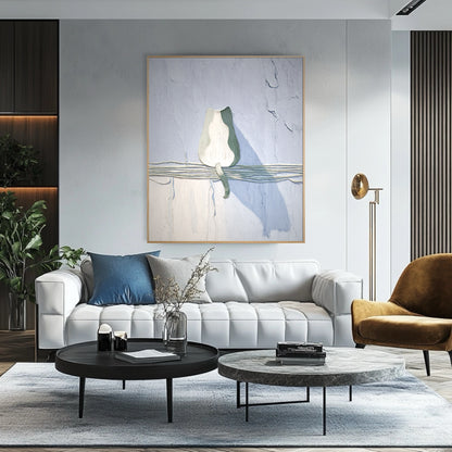 Cool-toned cat painting contrasts with dark wood paneling and black furniture, offering a light, neutral balance in a luxury space.