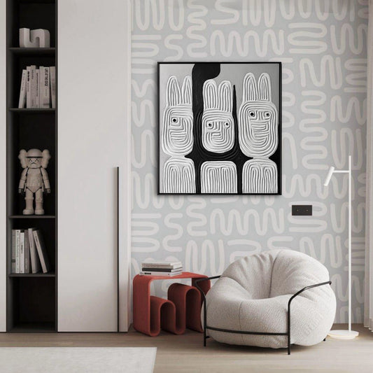 Abstract relief painting centers a contemporary bedroom with striking geometric wallpaper, a white fuzzy chair, and sleek built-in shelving.