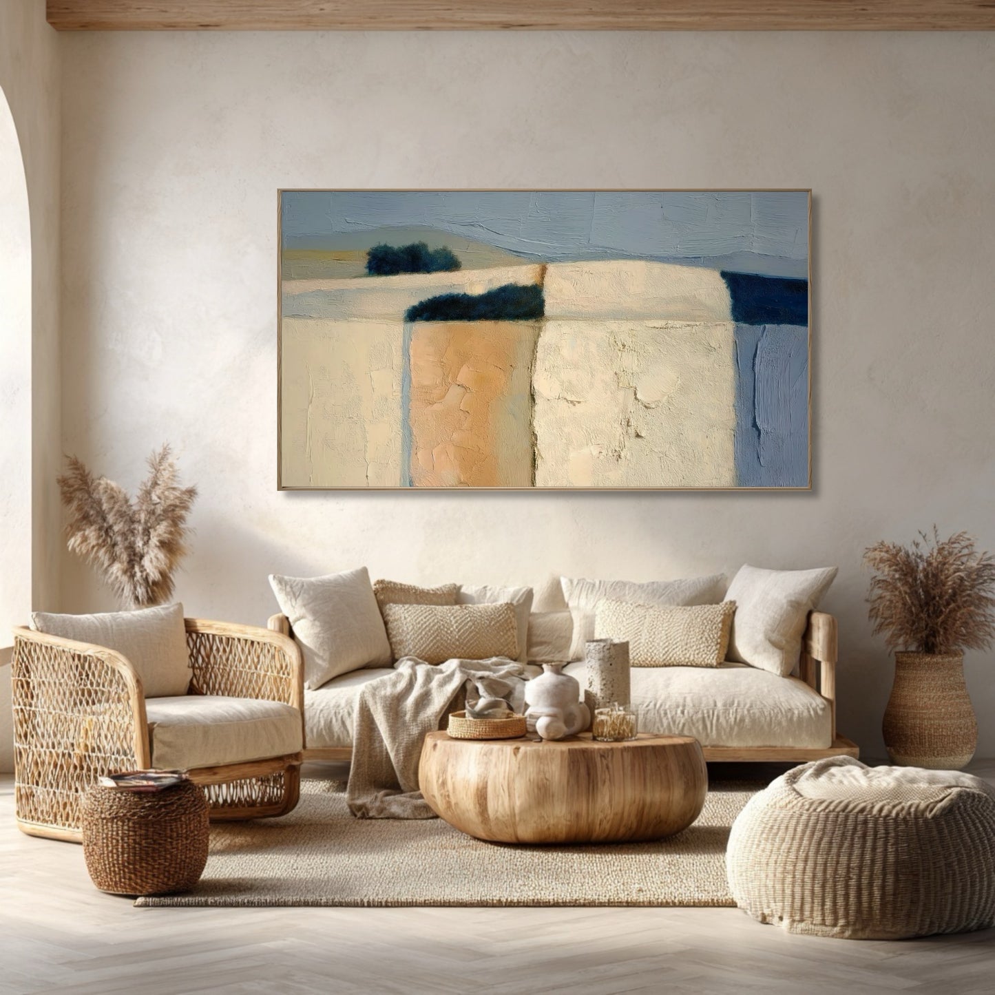 Original abstract fields art elevates a bohemian living space. Woven rattan and soft textures echo the painting's neutral, warm, and relaxed vibe.