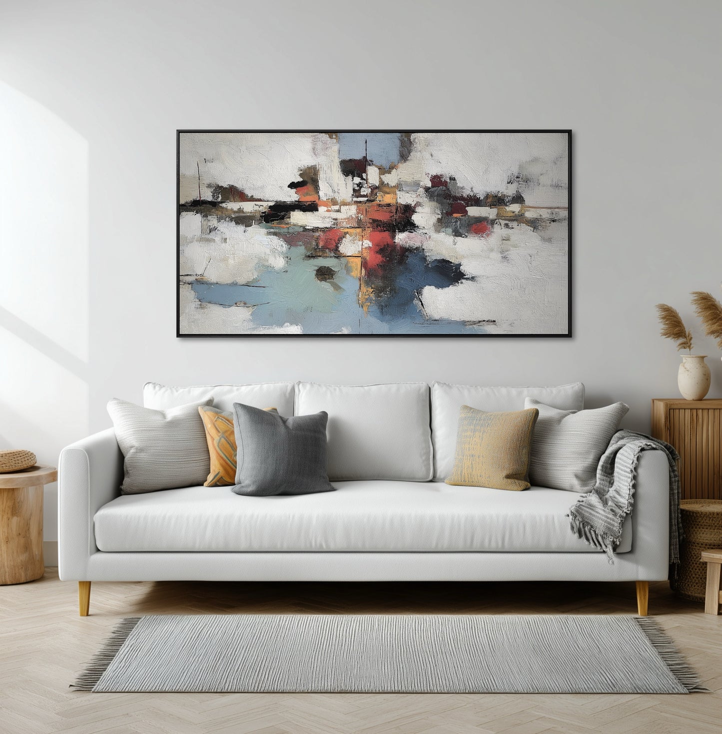 Expansive hand-painted art lending a moody, dramatic scale to the contemporary space, contrasting the clean lines of the low wood console.