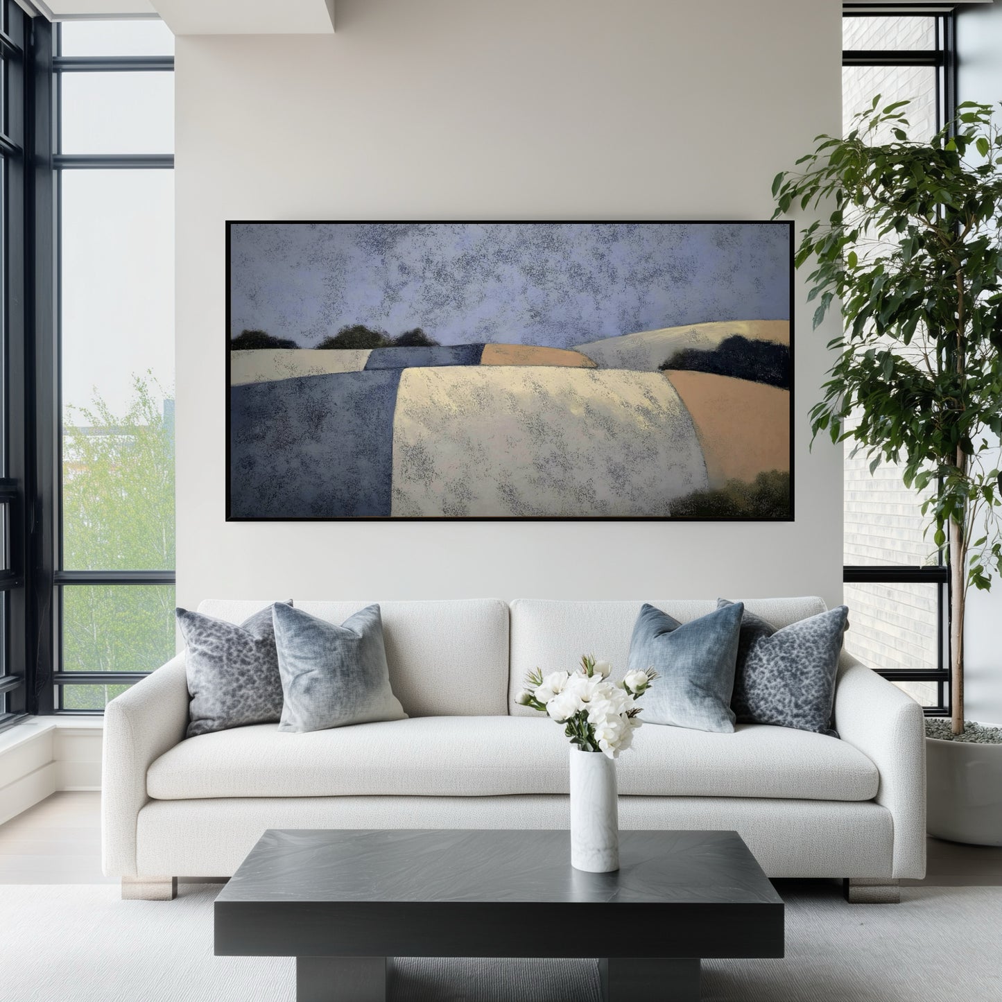 Original abstract fields painting over a white sofa in a bright, airy room with large windows and a tall green plant. Cool, minimalist aesthetic.