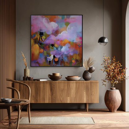 Expressive abstract painting is a focal point over a mid-century modern console; its bright colors pop against the moody gray wall and warm wood accents.