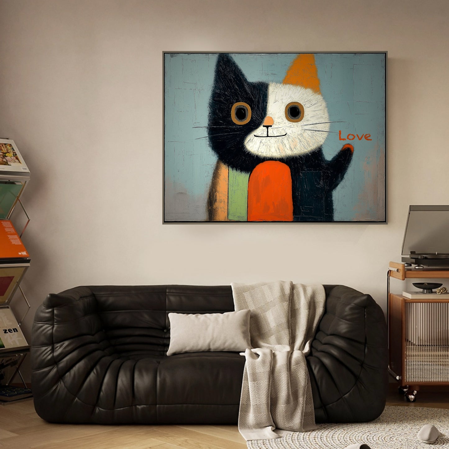 Original cat art over dark, tufted leather sofa; warm, modern living room with vintage record player.