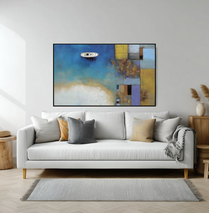 Geometric abstract art over a minimalist white sofa, its yellow blocks perfectly coordinating with the accent pillows for modern contrast.