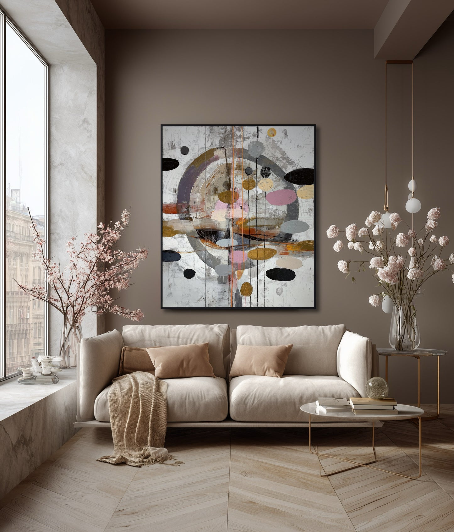 Abstract painting complementing the warm taupe walls and plush beige sofa in a cozy, inviting living space.