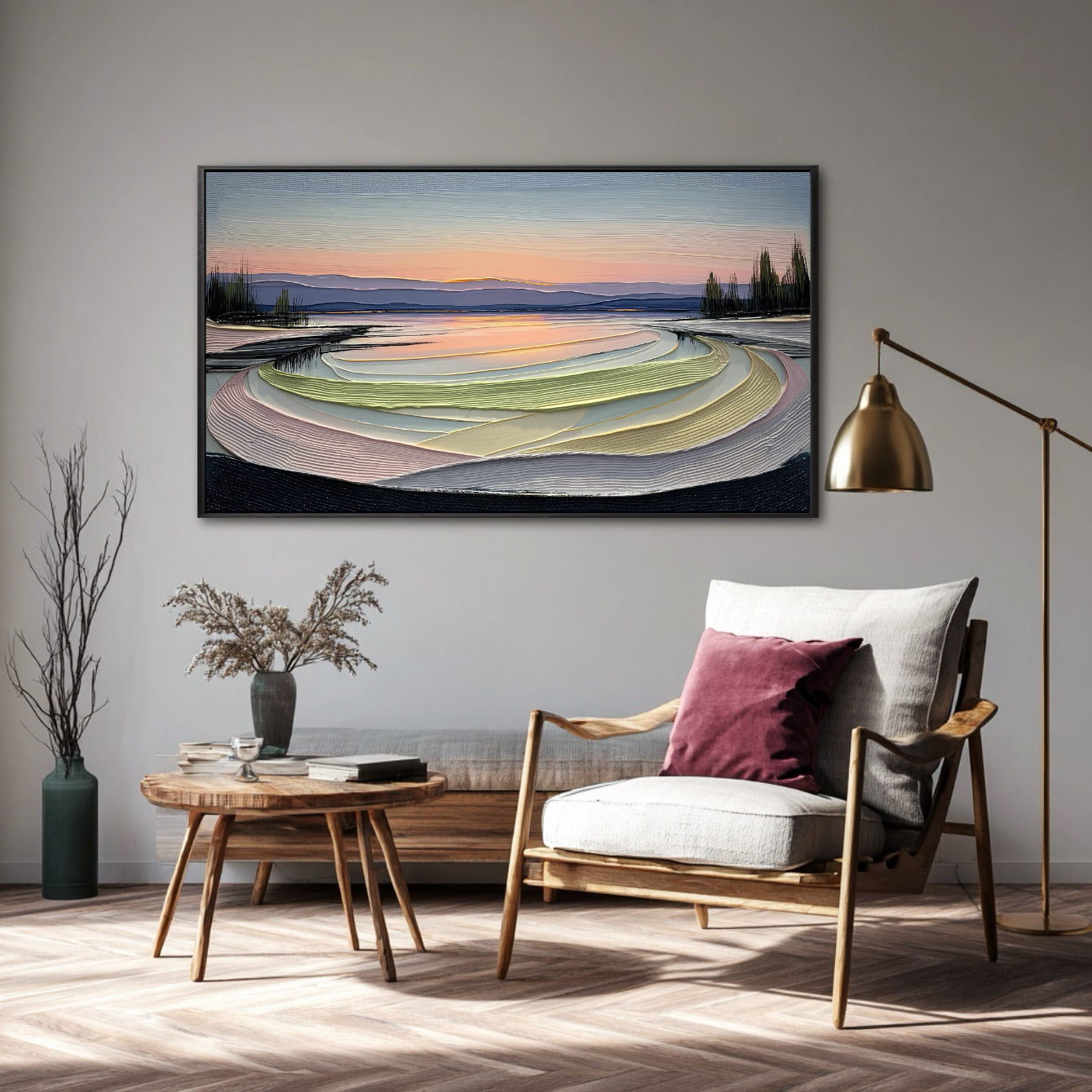 Original colorful landscape art provides a serene, expansive view over a wood-framed armchair and brass floor lamp in a warm, contemplative setting.