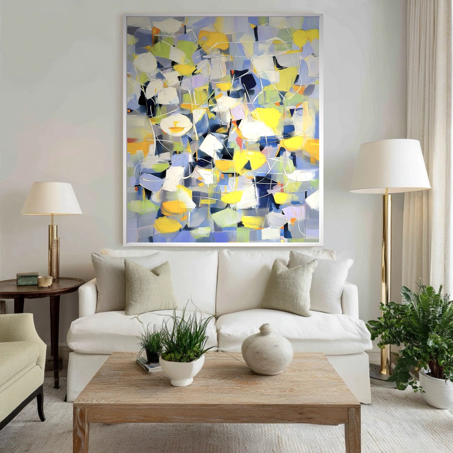 Vibrant abstract painting provides a modern, colorful contrast above a classic white sofa in a calm, traditional living space.