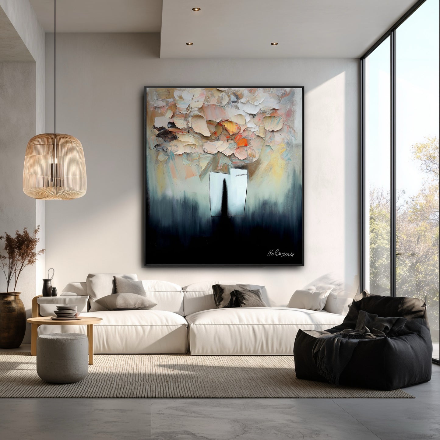This high-contrast abstract painting creates a dramatic focal point in a bright, minimalist space, drawing the eye by the large window.