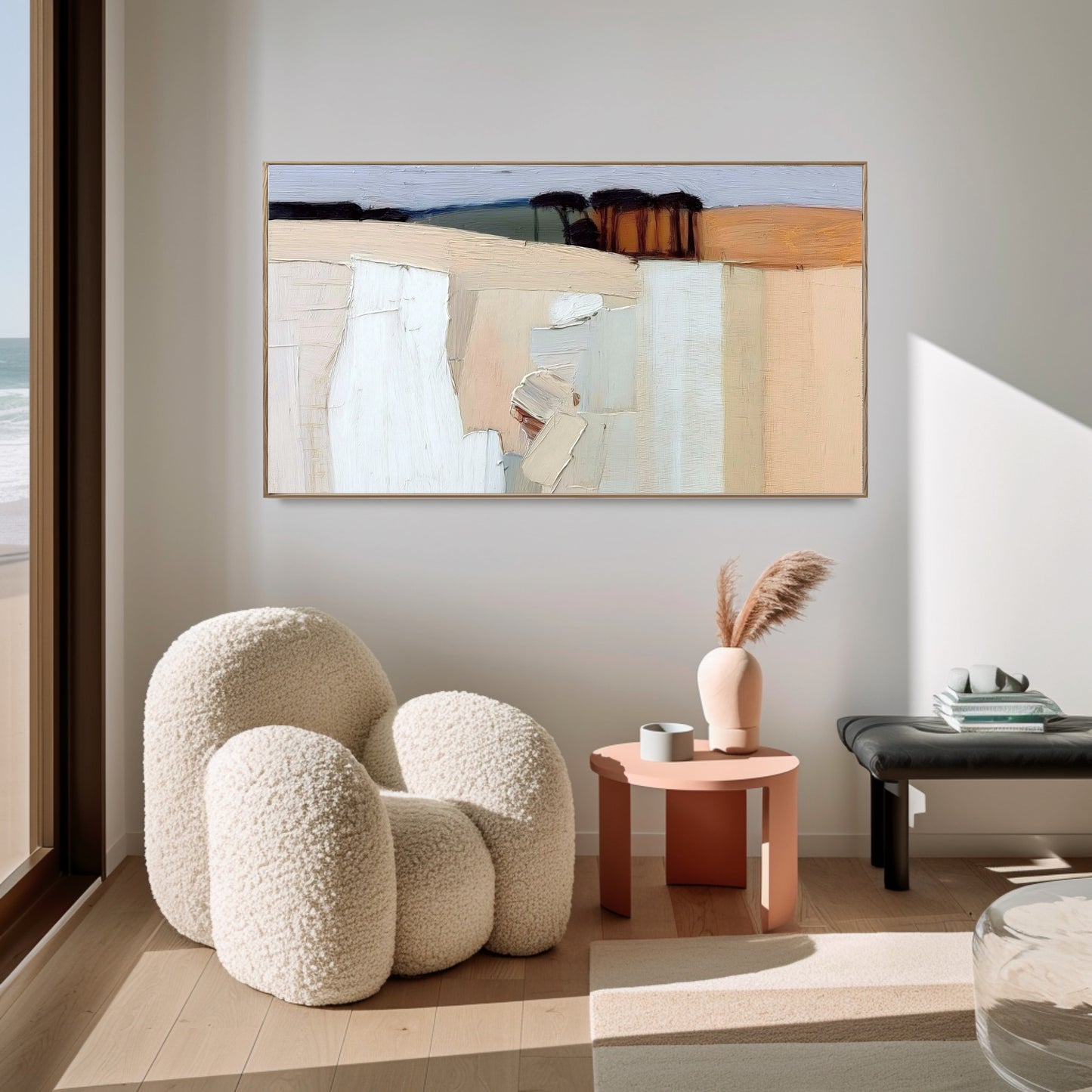 Original abstract painting enhancing a contemporary, light-filled living room with a cozy boucle chair and warm, inviting tones.