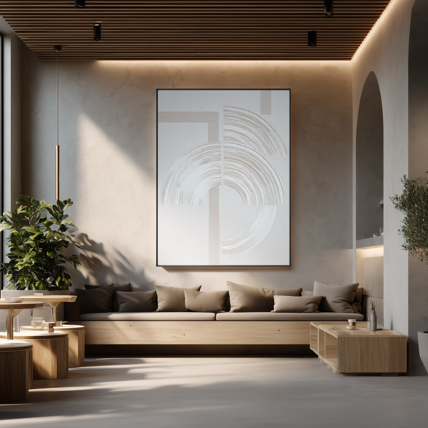Large textured abstract art in a serene, modern lounge with concrete walls, wood bench seating, and soft lighting.
