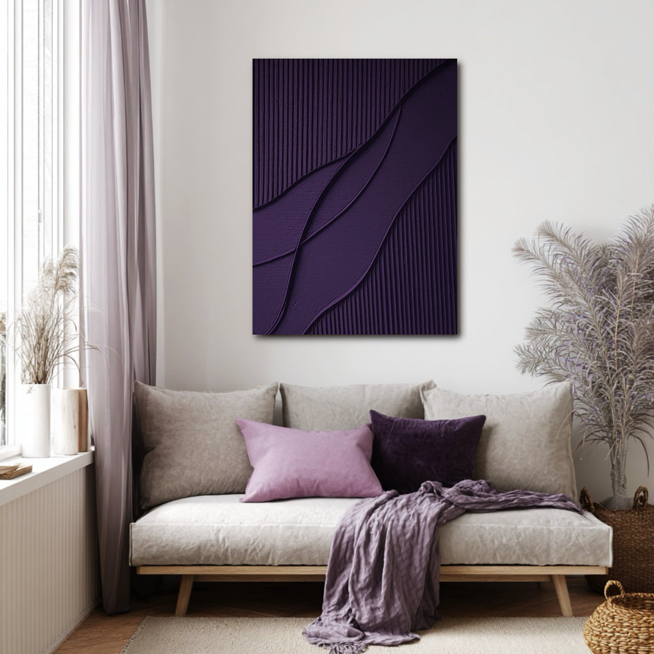 Original art on wall above sofa, deepening a cozy space with lilac tones and natural light. Adds richness to the soft decor.