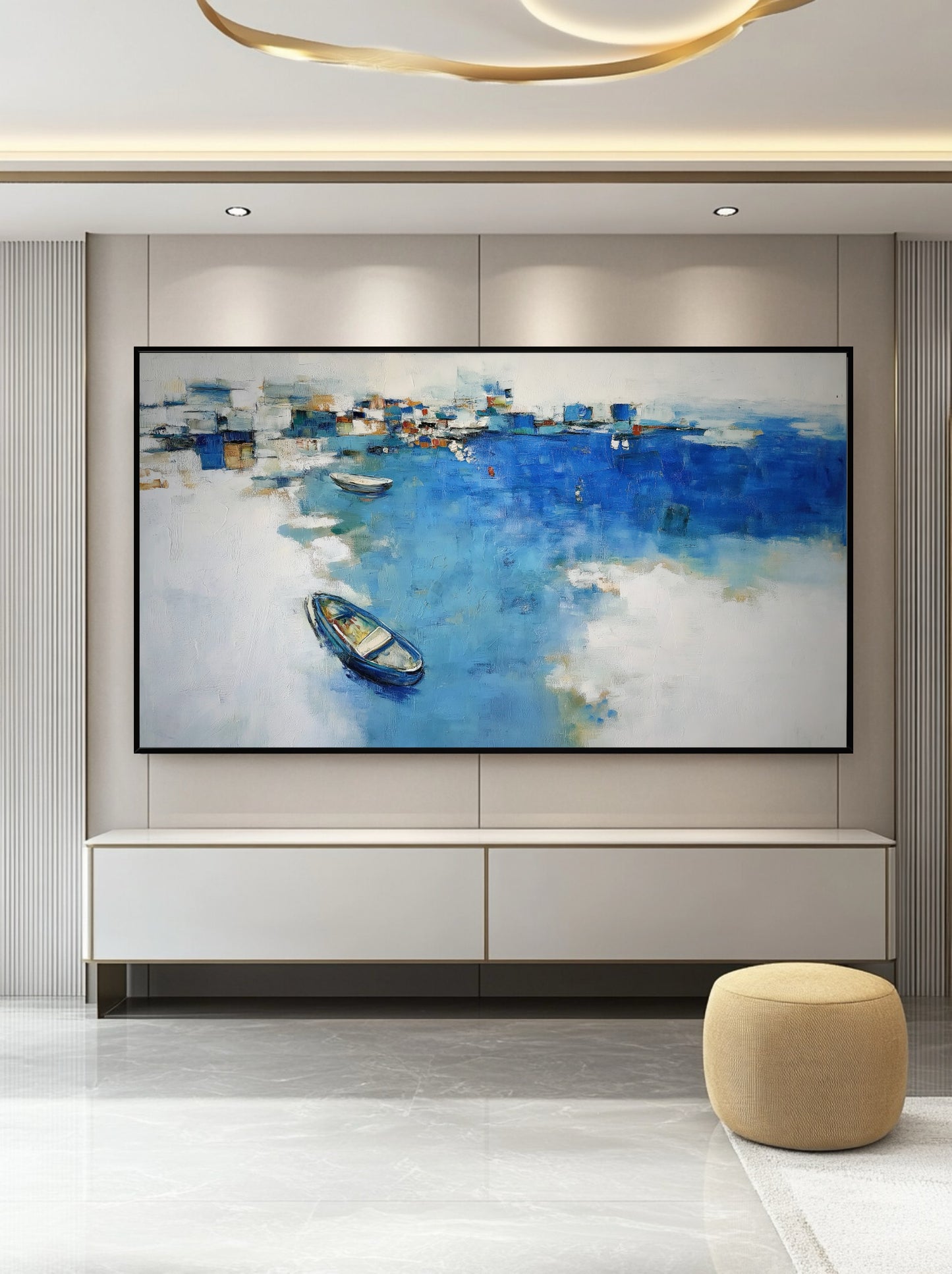 Expansive abstract harbor art centering a sleek white console, providing a blue color focal point in a luxurious, modern space.