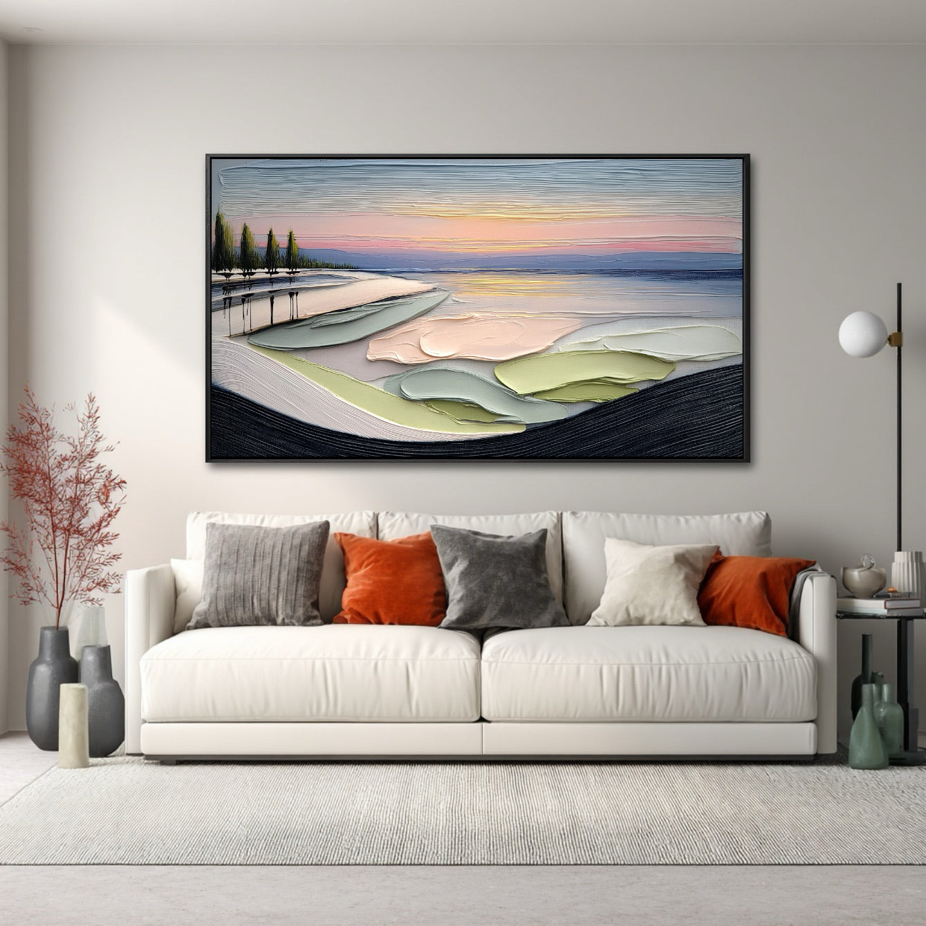 Impasto art above a clean white couch with orange and gray pillows in a bright, modern, minimalist living room.