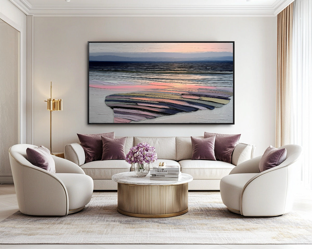 Abstract textured painting in a luxurious, elegant living space with cream chairs, mauve cushions, and a gold and marble coffee table.