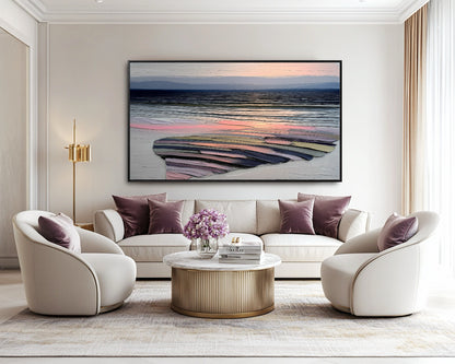 Abstract textured painting in a luxurious, elegant living space with cream chairs, mauve cushions, and a gold and marble coffee table.