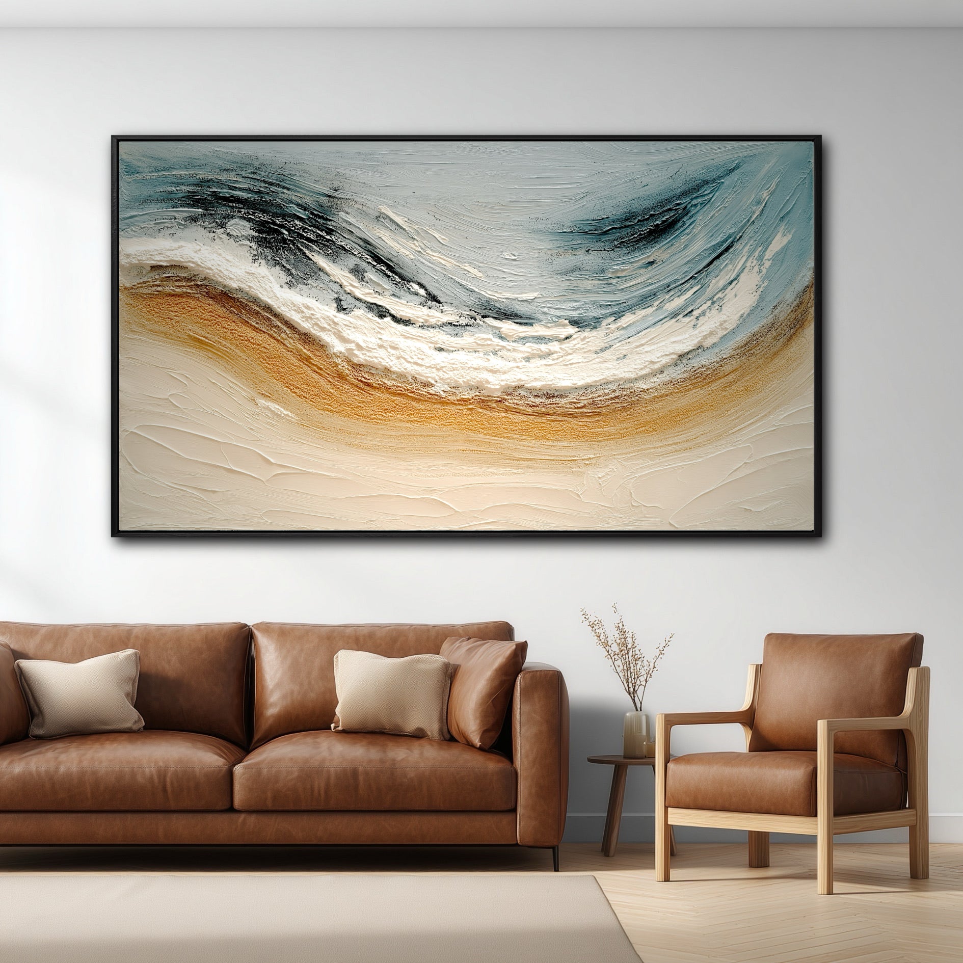 The abstract ocean painting's dynamic flow and earthy gold tones perfectly balance the rich brown leather sofa in this modern, neutral room.