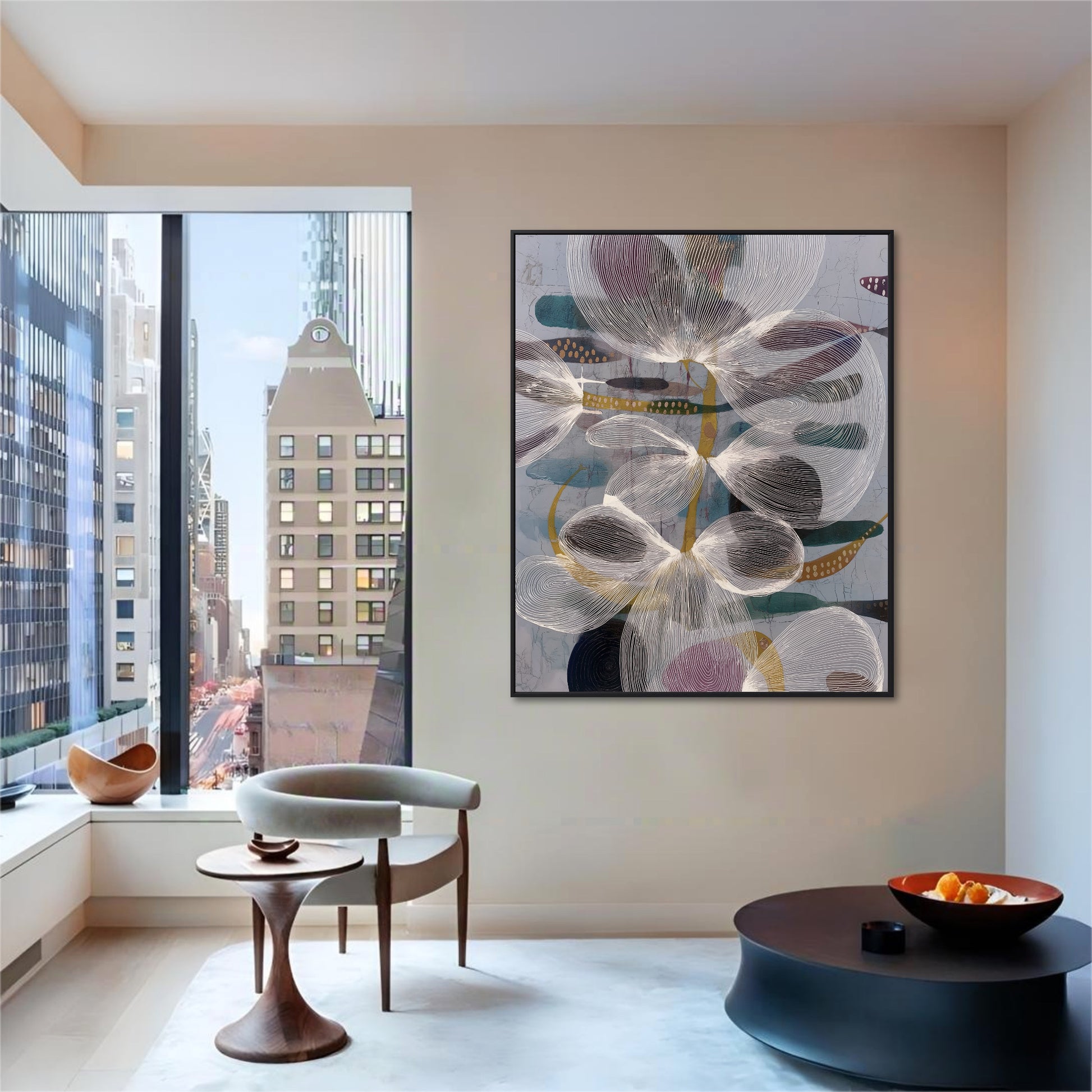 Delicate floral line-work artwork anchors the beige wall of this modern, minimalist space with a dramatic skyscraper view.