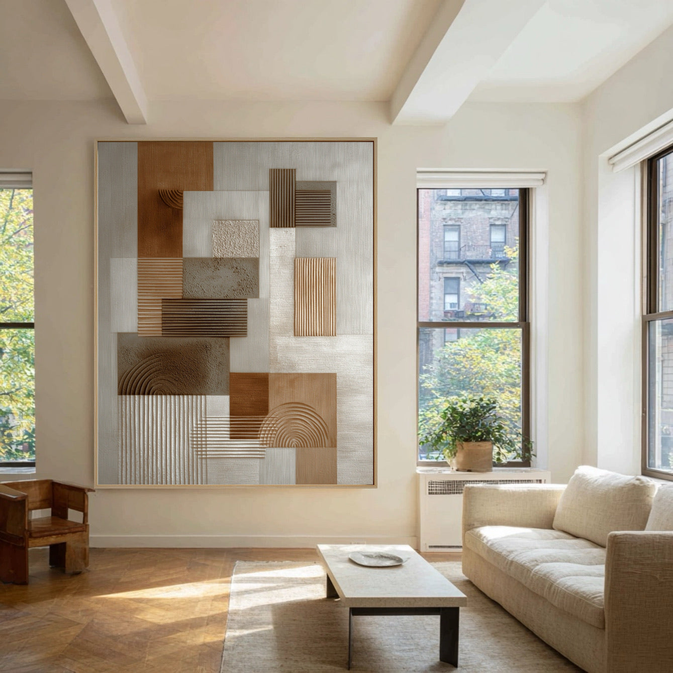 Textured geometric art dominating a bright loft space with multiple city-view windows and high ceilings.
