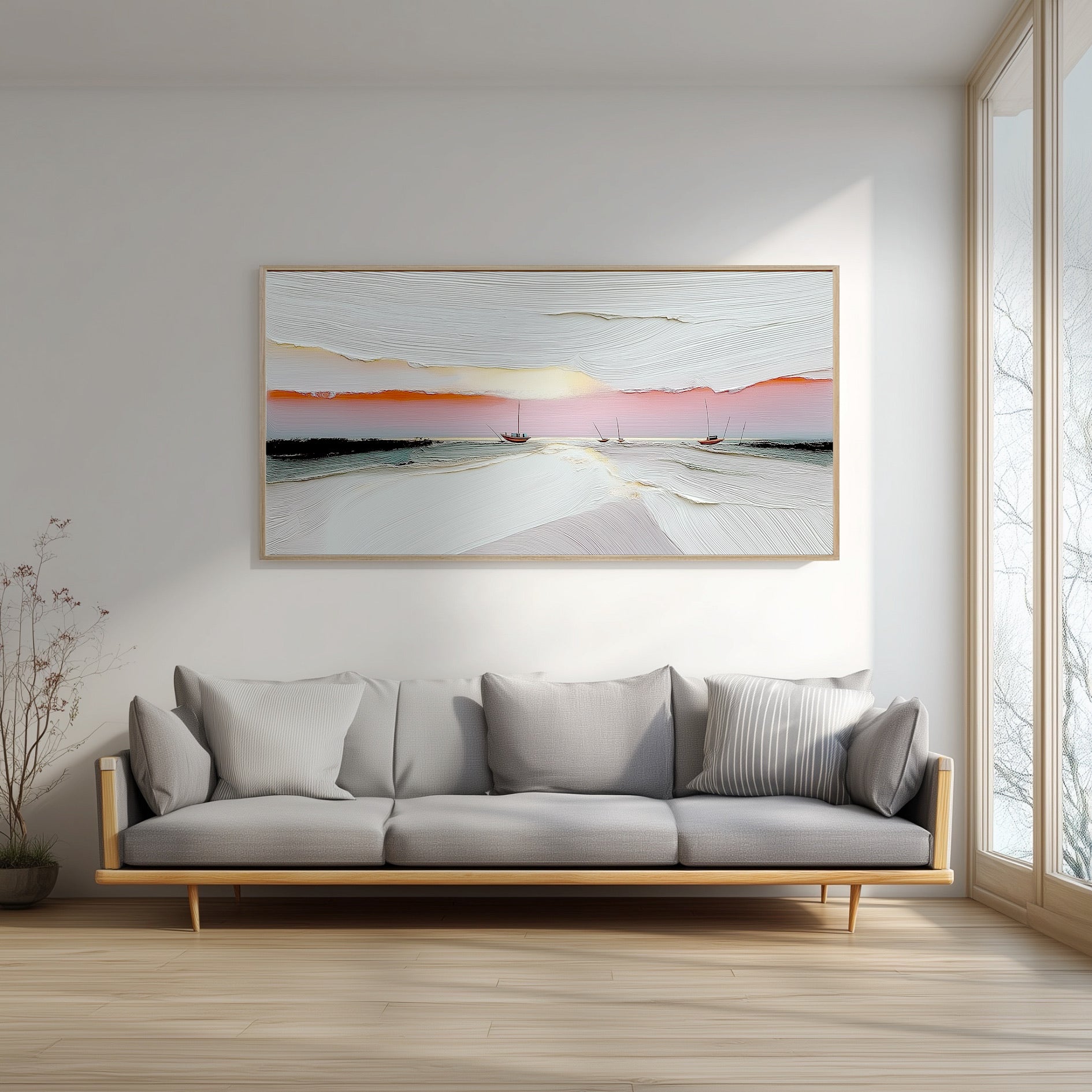 In a bright, minimalist room, the abstract sunset painting provides a essential splash of warm color above a sleek, modern gray sofa.