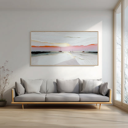 In a bright, minimalist room, the abstract sunset painting provides a essential splash of warm color above a sleek, modern gray sofa.